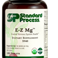 Image of E-Z Mg bottle next to tablets of magnesium supplements.