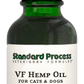 Image of a bottle of liquid VF Hemp Oil from Standard Process Veterinary Formulas next to a dropper that is included with the bottle.