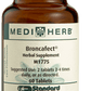A bottle of Broncafect herbal supplement next to a tablet.